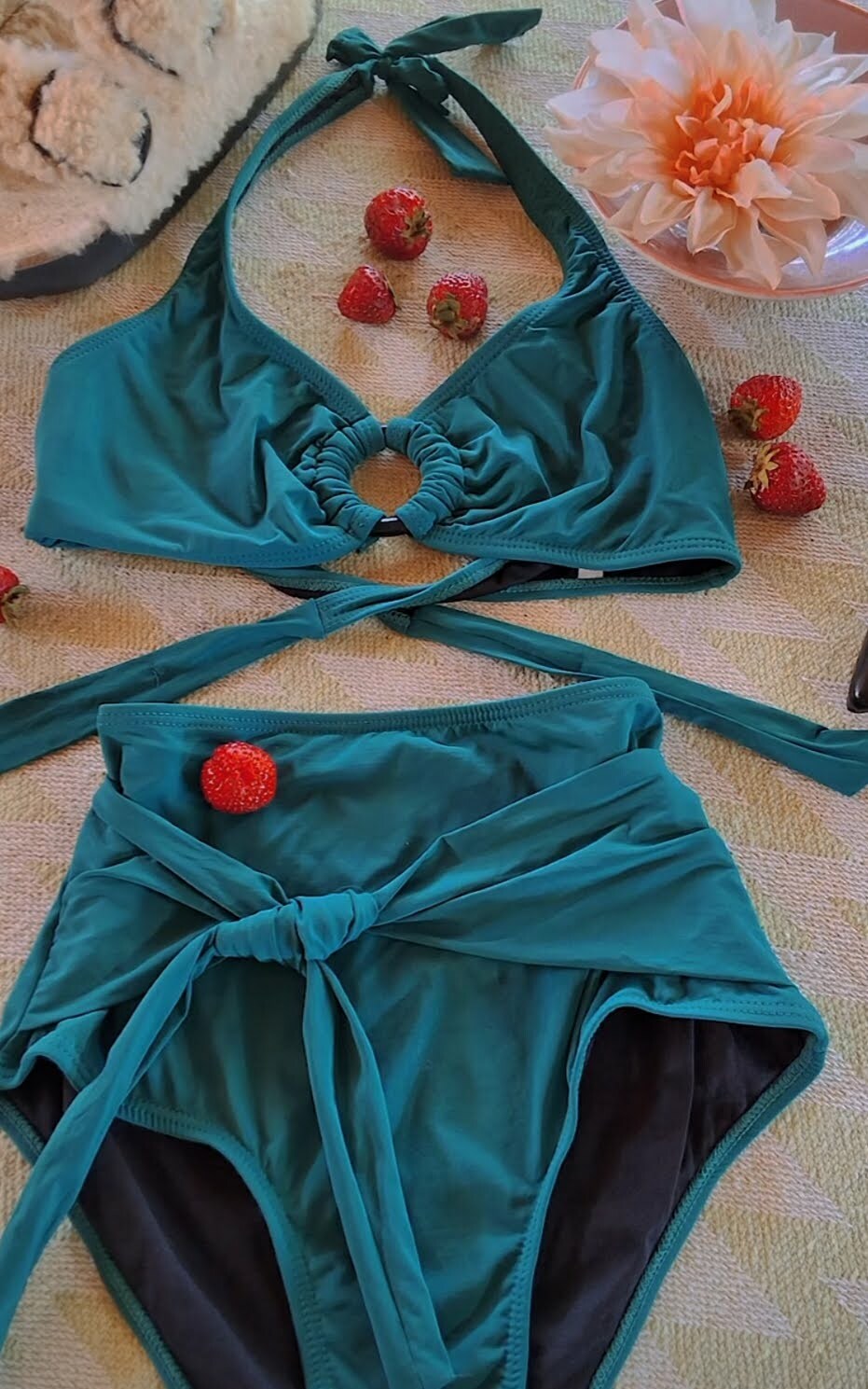 Flatlay of the forest green Leontyn full coverage bikini - Jasikini swimwear